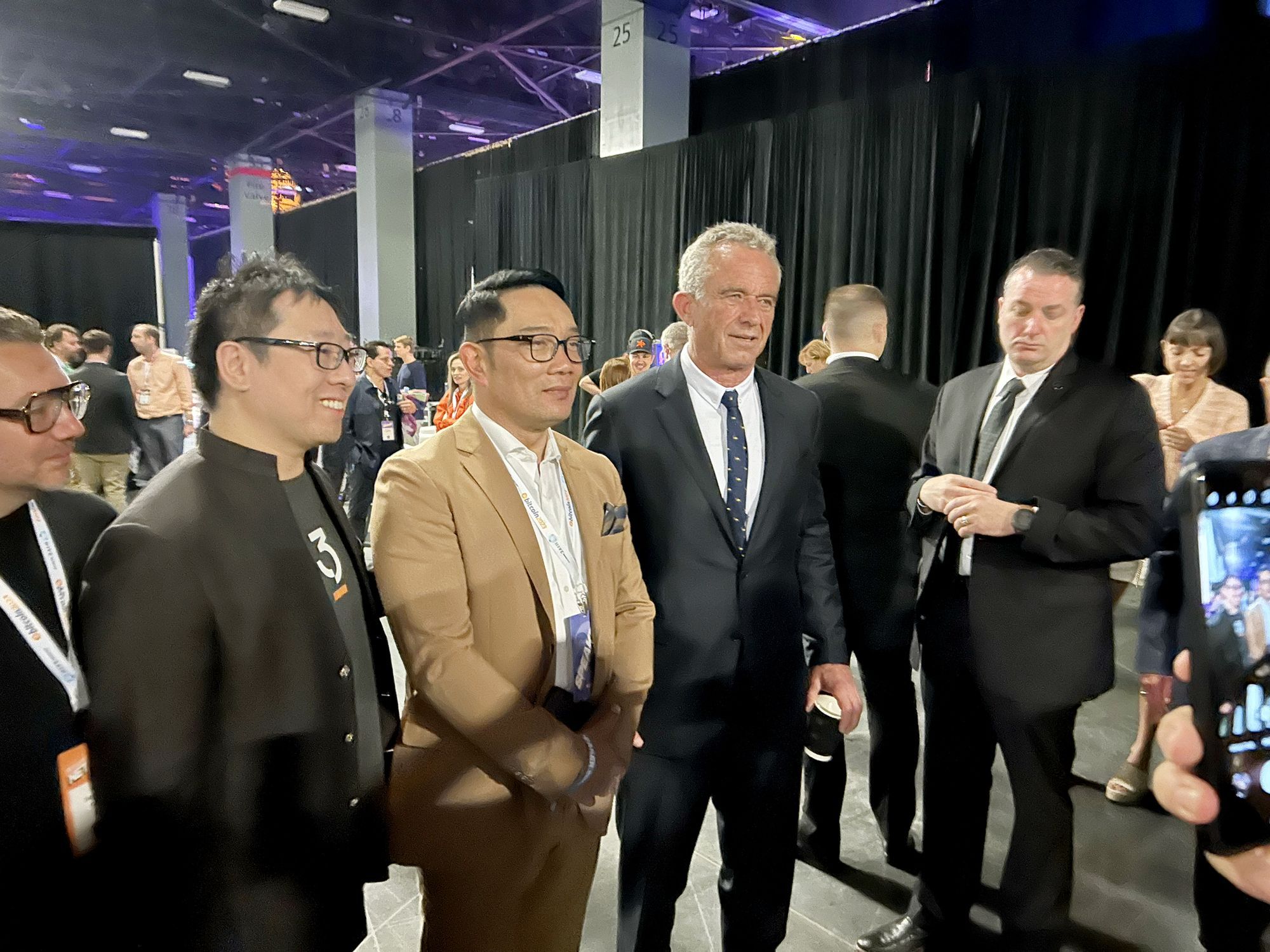 Samson Mow, Governor Ridwan Kamil, and Robert F. Kennedy Jr. pose for a photo