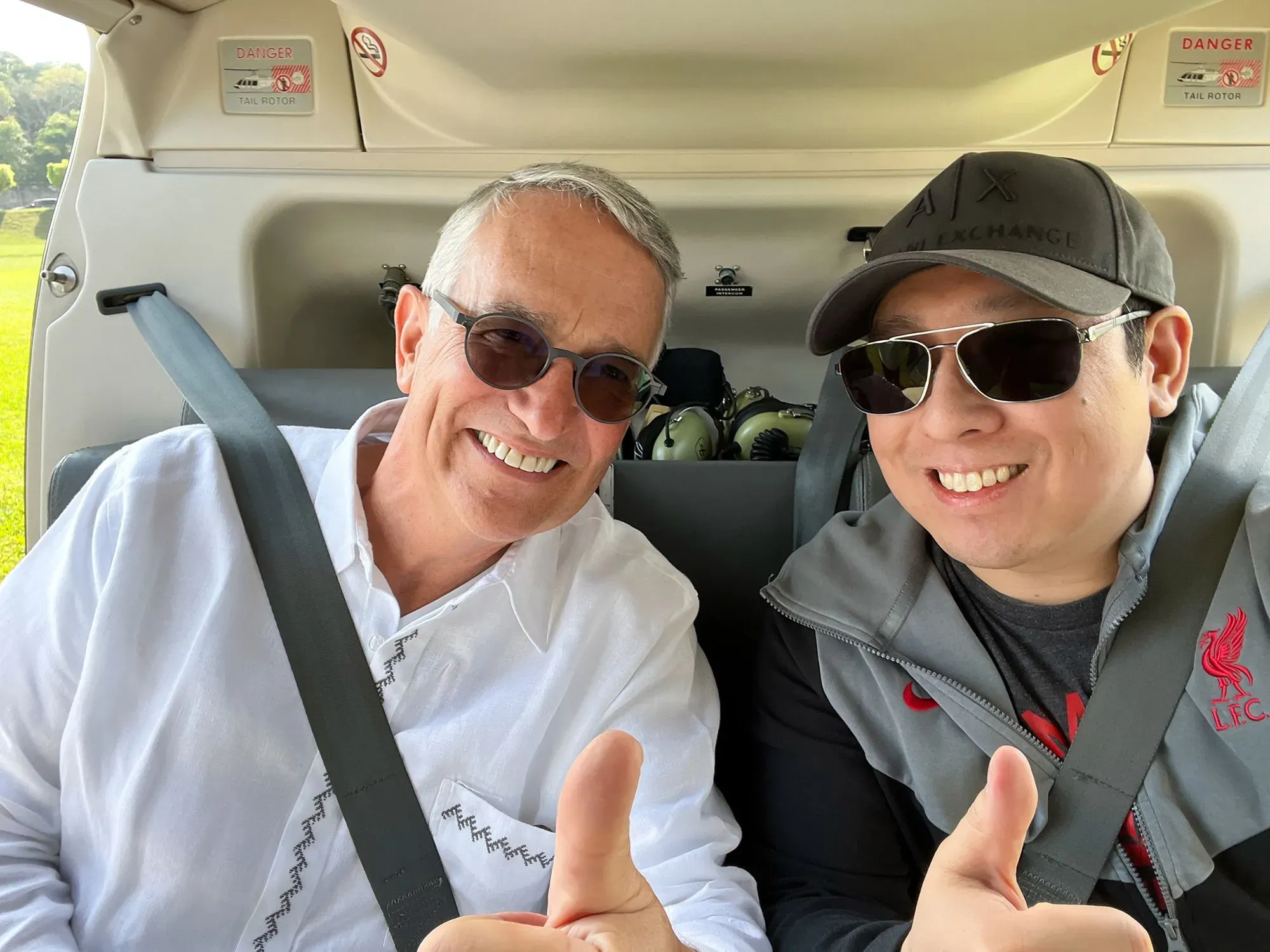 Ricardo Salinas and Samson Mow Taking a Helicopter to the Berlin Geothermal Plant