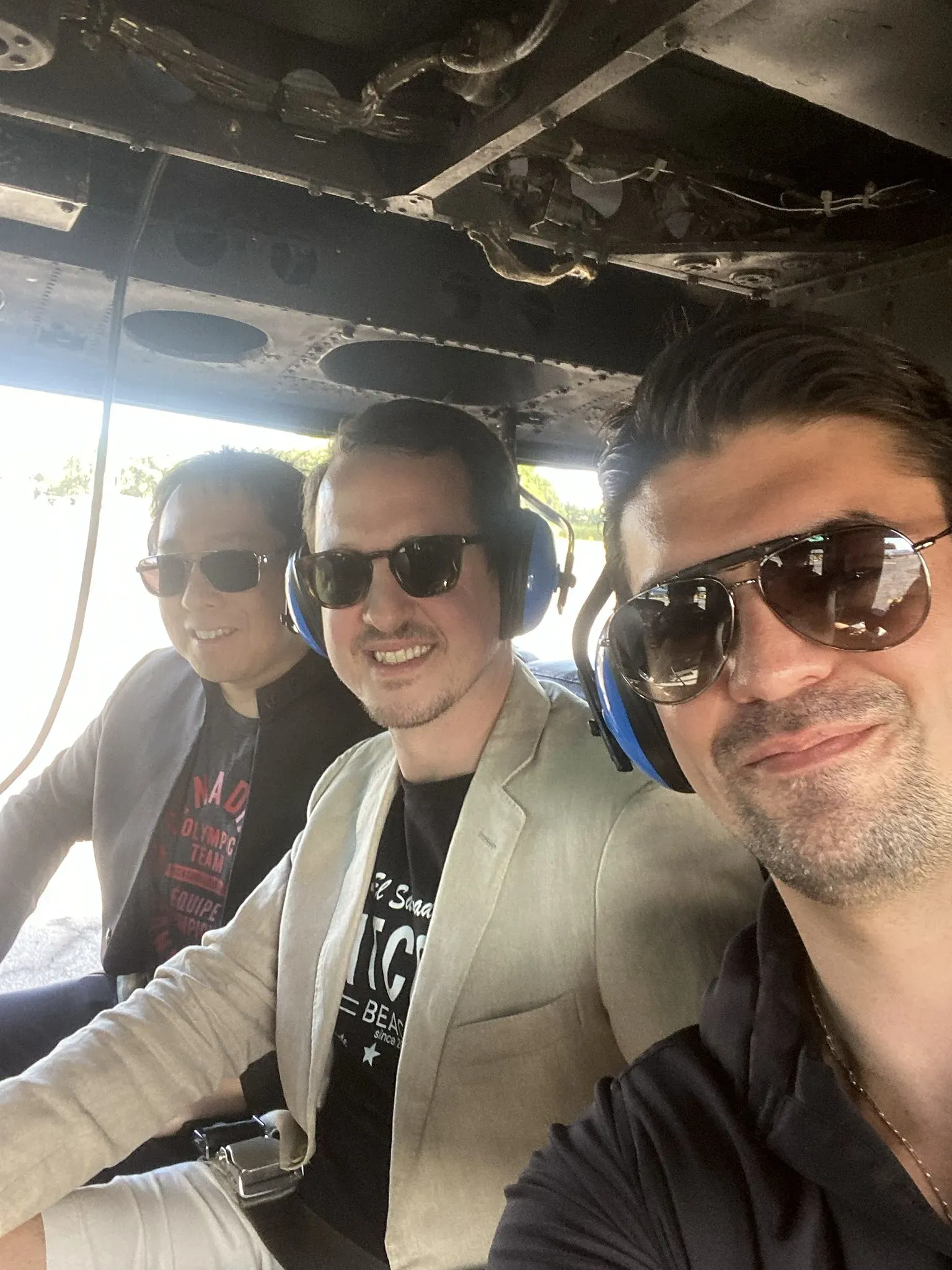 Samson Mow, Prince Filip, Edwin Rivas on a Helicopter
